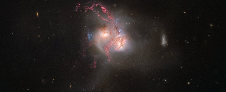 An ongoing cosmic collision